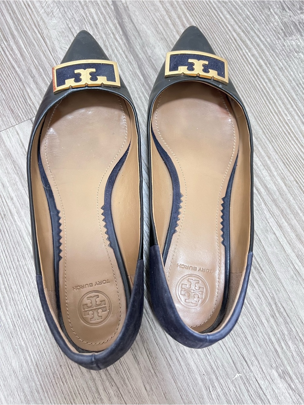 Tory Burch Navy Pointed Toe Flats with Gold Logo Plaque